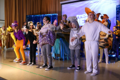 Group of people in costumes on stage for the show Finding Nemo