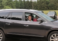 Woman in a car on the first day of kindergarten for P-H-M schools.