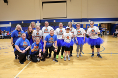 Group picture of all the Moran teachers and staff who participated in the staff on staff basketball game