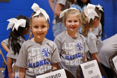 Girl student cheerleaders cheering for the players during the games