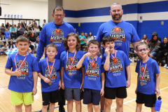 Second grade "Blue Team" student players with their coaches