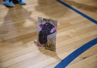 Mouse card on gym floor.